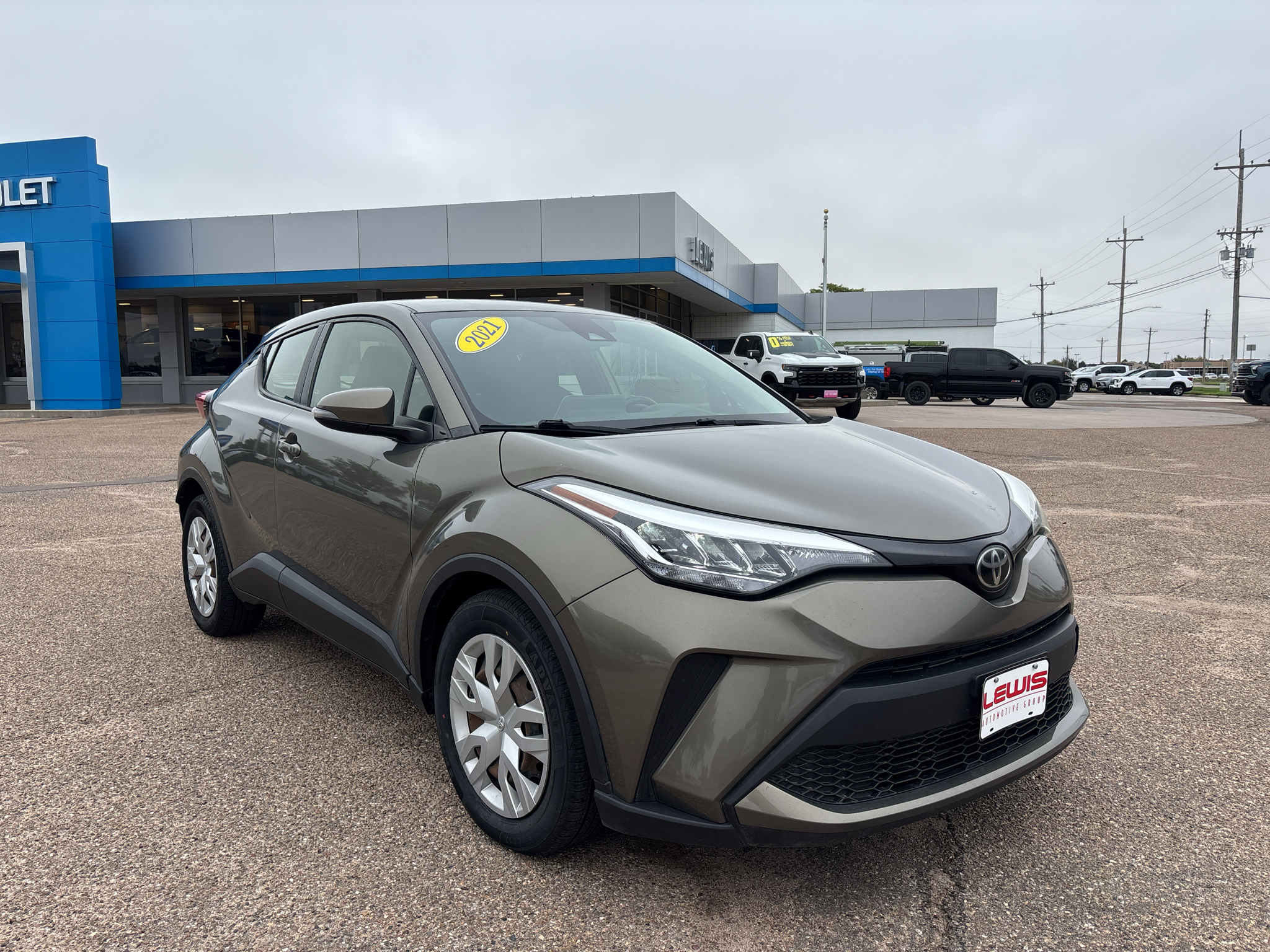 Used 2021 Toyota C-HR LE with VIN JTNKHMBX3M1106537 for sale in Garden City, KS