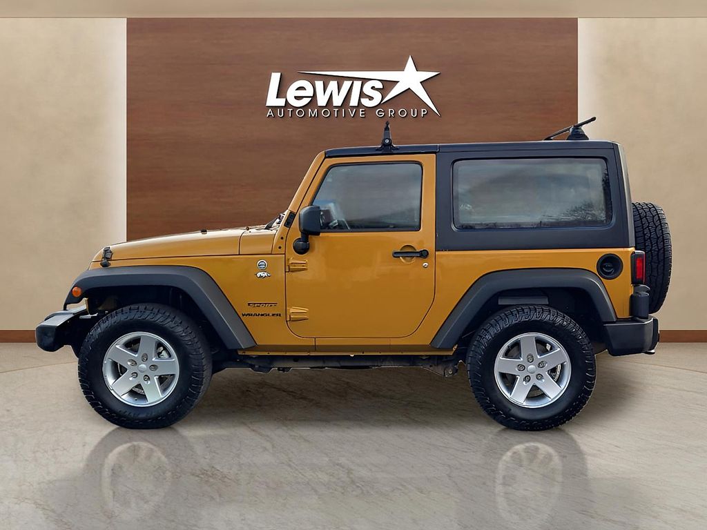 Used 2014 Jeep Wrangler Sport with VIN 1C4AJWAG5EL203102 for sale in Fayetteville, AR