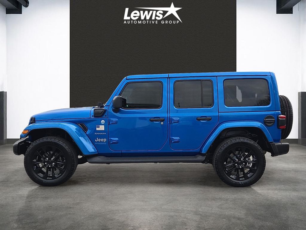 Used 2021 Jeep Wrangler Unlimited Sahara 4XE with VIN 1C4JJXP60MW783098 for sale in Fayetteville, AR