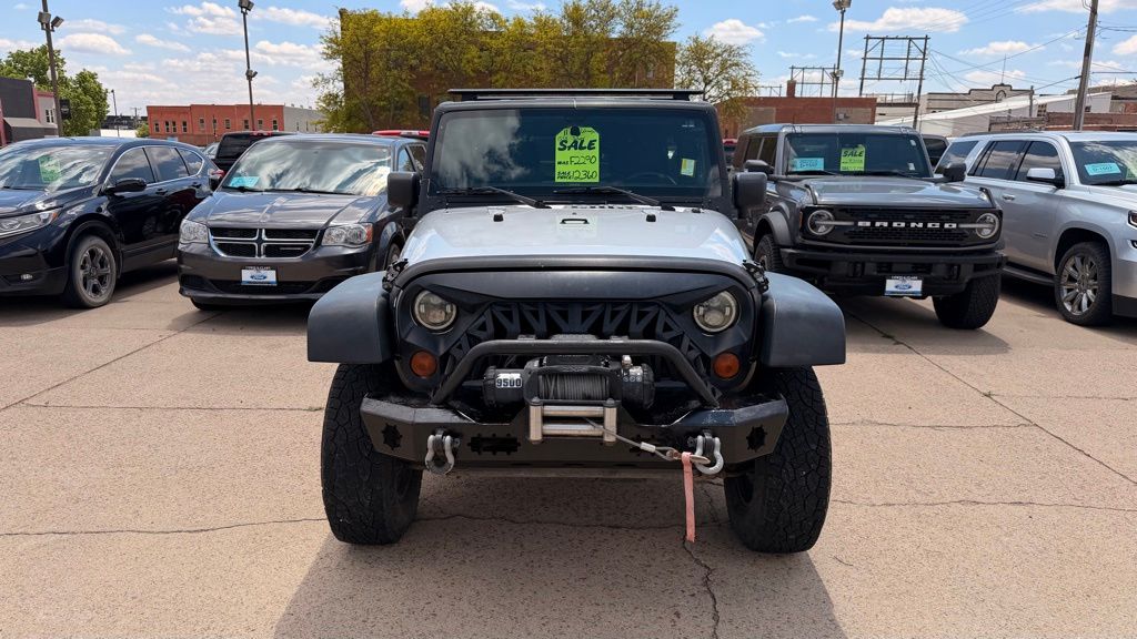 Used 2011 Jeep Wrangler Unlimited Sport with VIN 1J4HA3H17BL546448 for sale in Yankton, SD