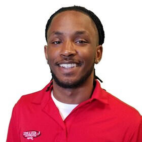 Staff member T.J. Thomas from ID_6f9d33