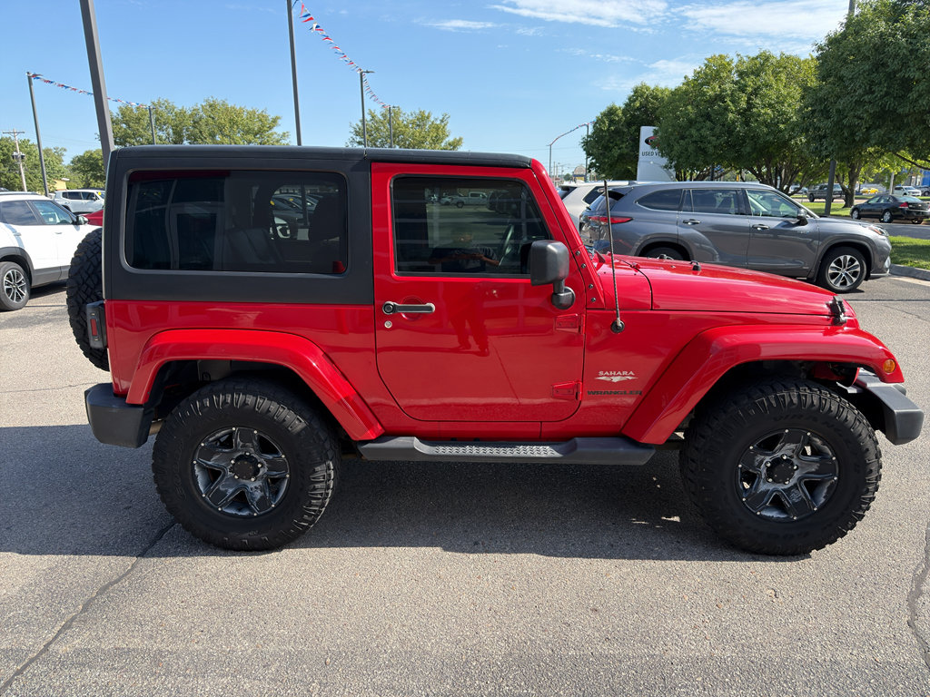 Used 2014 Jeep Wrangler Sahara with VIN 1C4GJWBG2EL284939 for sale in Garden City, KS
