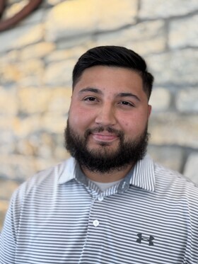 Staff member Gio Gomez from ID_b21f0ae2c6ea