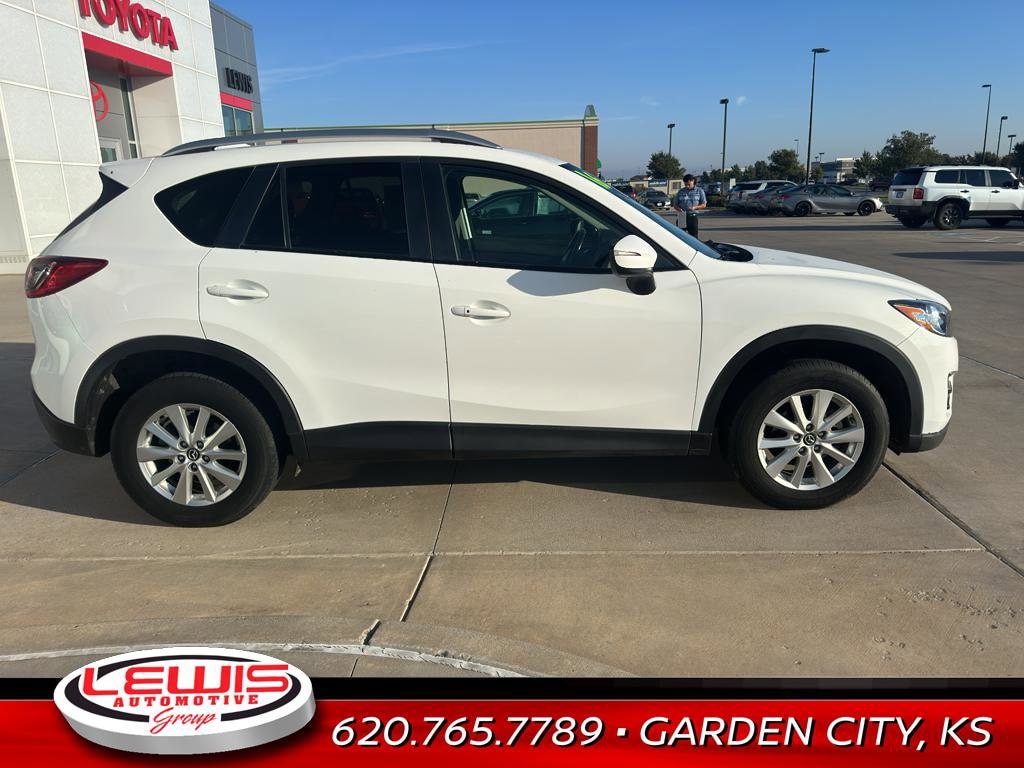 Used 2016 Mazda CX-5 Touring with VIN JM3KE2CY9G0626509 for sale in Garden City, KS