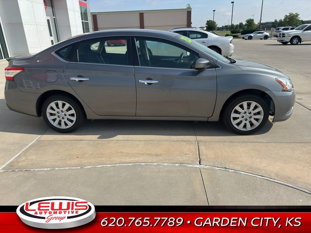 Used 2015 Nissan Sentra S with VIN 3N1AB7AP7FY220496 for sale in Garden City, KS