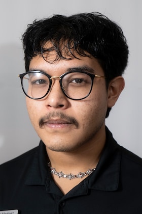 Staff member Nicholas Elliot Martinez from ID_2ed7c1e3a74d