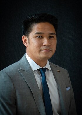 Staff member Roland Rimando from 200dcf0e6521