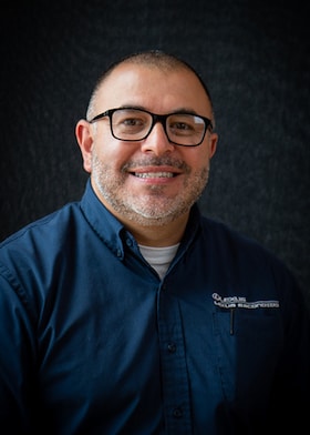 Staff member Eric Ledesma from 9f04d6ad8886