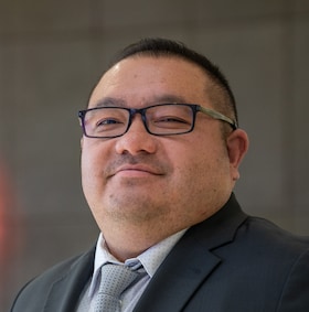 Staff member Phil Lo from ID_3668a9b0de40