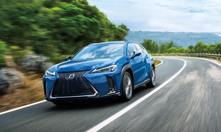 2021 Lexus RX exterior driving along mountain road
