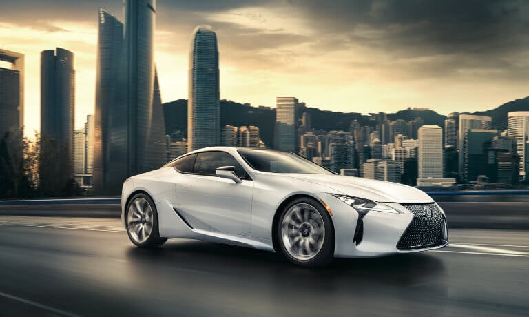 2021 Lexus LC exterior driving outside city skyline