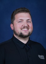 Staff member TAYLER DELMORE from ID_a8d7543adcba