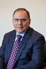 Staff member Anthony Celia from ID_31b87a82b956