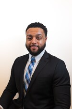 Staff member S'ba Kitchener from ID_31b87a82b956