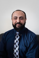 Staff member Amr Rizk from ID_032135195595