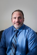 Staff member James Buscemi from ID_032135195595