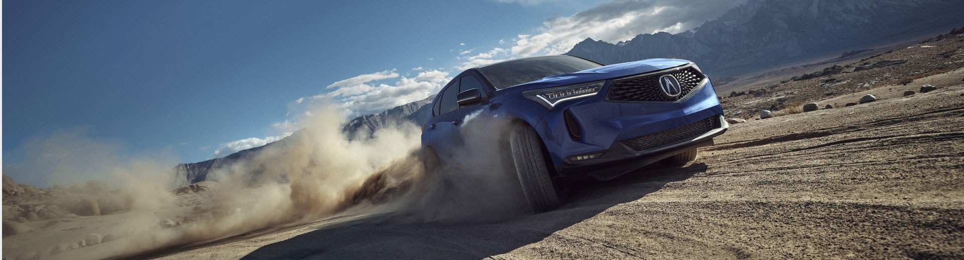 2024 Acura RDX driving off-road in the desert