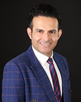 Staff member Max Majedi from 1a81fbcb595b