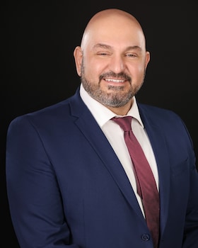 Staff member Michael Iriana from 8c33d00ede2e