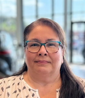 Staff member Norma Mujica from ID_8092f22e8708