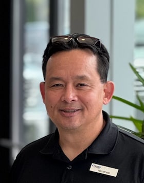 Staff member Raymond Sarmiento from ID_8092f22e8708