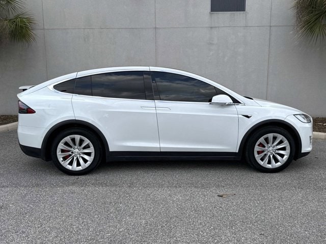 Used 2021 Tesla Model X Performance with VIN 5YJXCAE4XMF323504 for sale in Jacksonville, FL