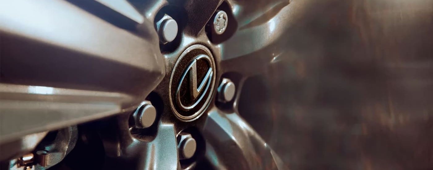 A close up shows the wheel on a 2024 Lexus UX.