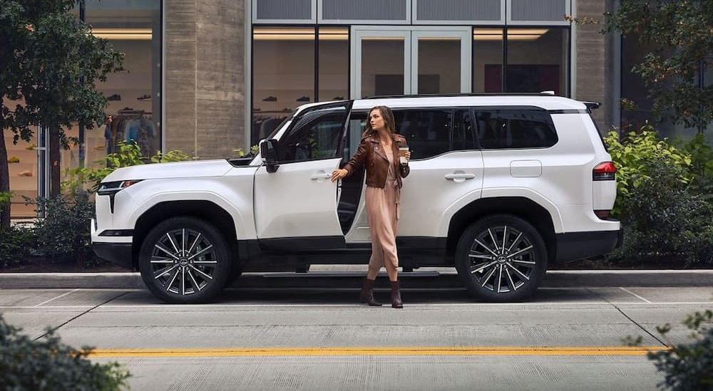 A person is shown exiting a white 2024 Lexus GX.