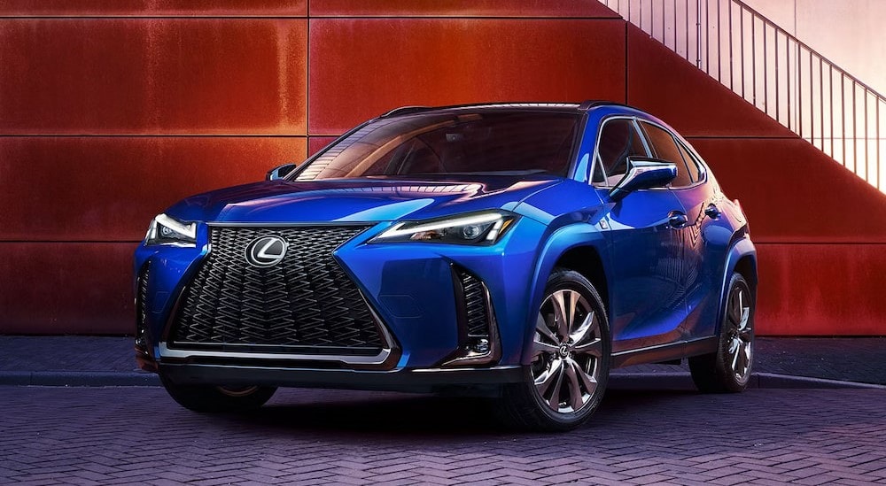 A blue 2024 Lexus UX 250h is shown parked after viewing a Lexus UX Hybrid for sale.