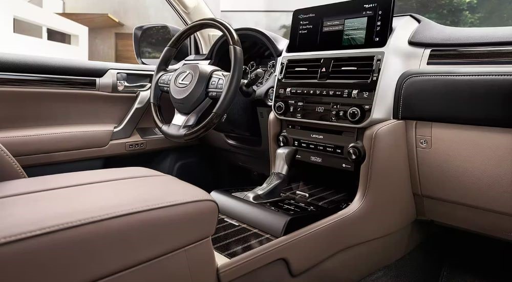 The brown and black interior is shown in a 2023 Lexus GX for sale.