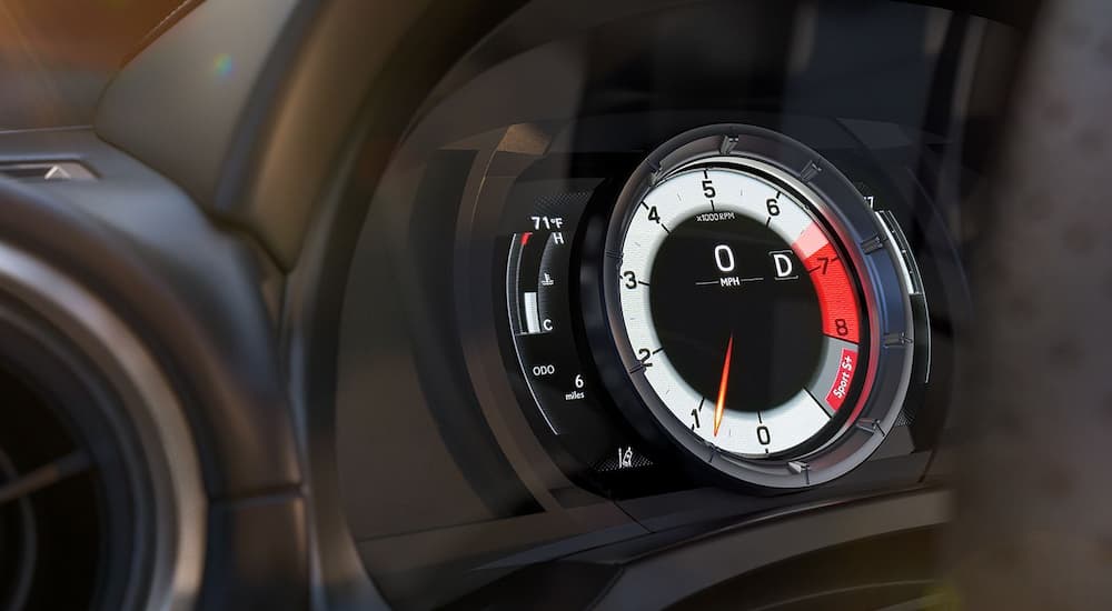 A close up of the speedometer in a 2024 Lexus IS is shown.