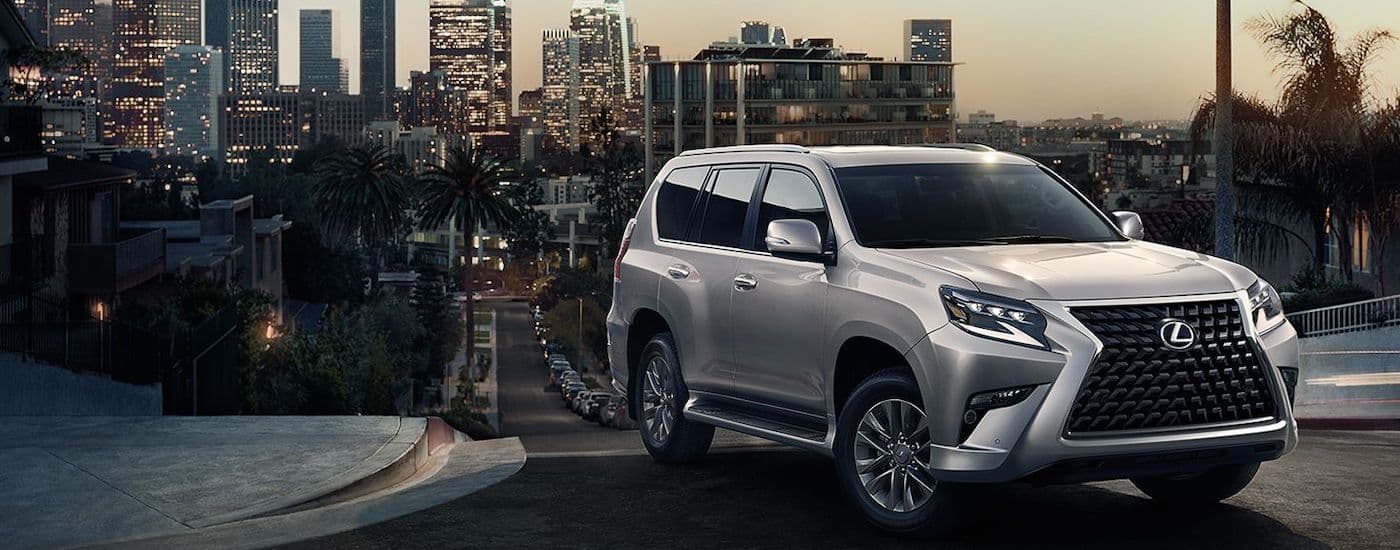 A silver 2023 Lexus GX is shown from the front at an angle.