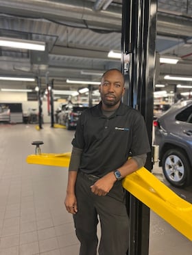 Staff member Tim Celestine from ID_f0faf3bd4224