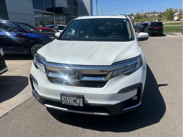 Used 2022 Honda Pilot Touring with VIN 5FNYF6H61NB000062 for sale in Maplewood, Minnesota