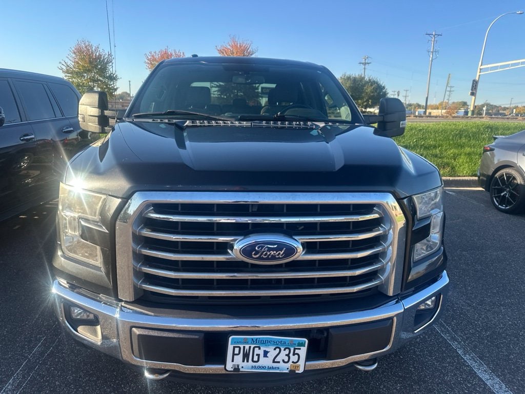 Used 2015 Ford F-150 XLT with VIN 1FTFW1EG7FFB02468 for sale in Maplewood, Minnesota