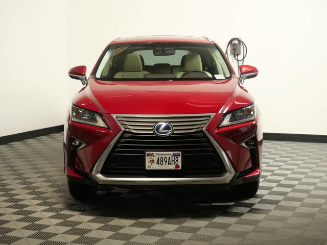 Used 2016 Lexus RX 450h with VIN 2T2BGMCA6GC001696 for sale in Maplewood, MN