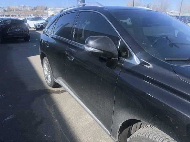 Used 2013 Lexus RX 450h with VIN JTJBC1BAXD2064047 for sale in Maplewood, MN