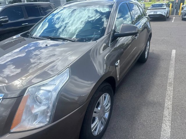 Used 2014 Cadillac SRX Luxury Collection with VIN 3GYFNBE33ES582812 for sale in Maplewood, Minnesota