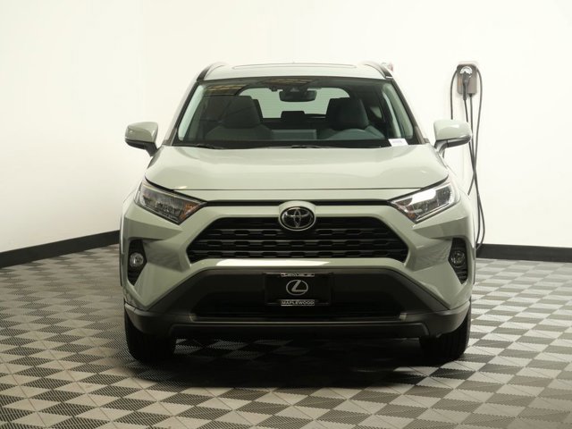 Used 2021 Toyota RAV4 XLE with VIN 2T3P1RFV7MW209689 for sale in Maplewood, Minnesota