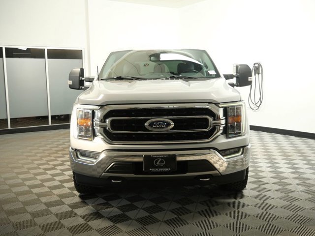 Used 2021 Ford F-150 XLT with VIN 1FTFW1E88MKD22618 for sale in Maplewood, Minnesota