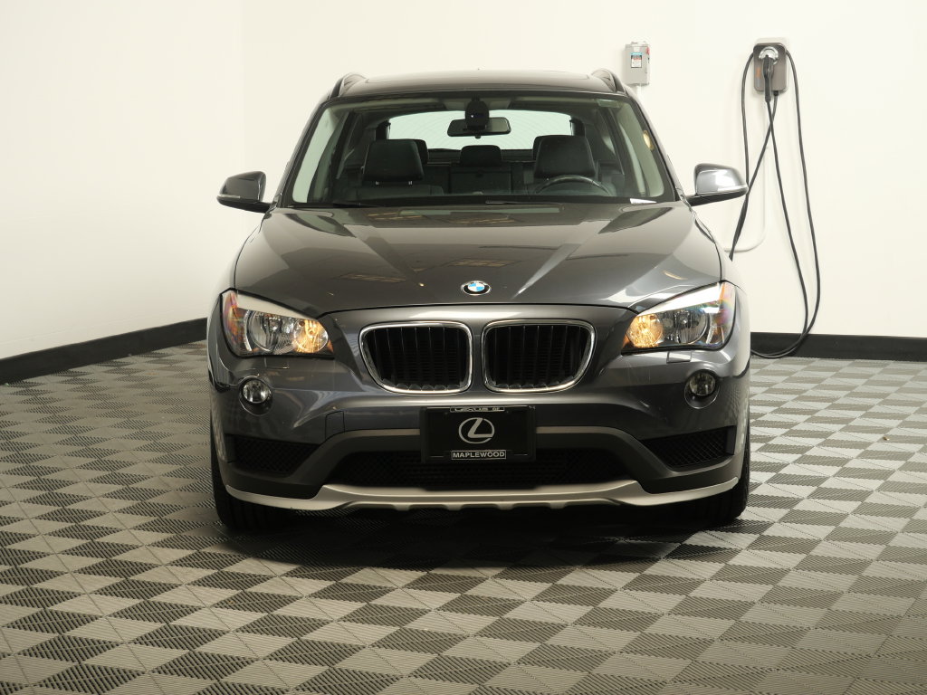 Used 2015 BMW X1 28i with VIN WBAVL1C54FVY39328 for sale in Maplewood, Minnesota