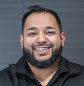 Staff member Joel Valdez from fe595ec01bec