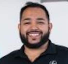 Staff member Joel Valdez from fe595ec01bec