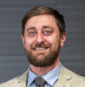 Staff member Mike Mueller from 21533559e63f