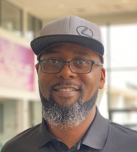 Staff member Garri Christopher from ID_22496bcfa75d