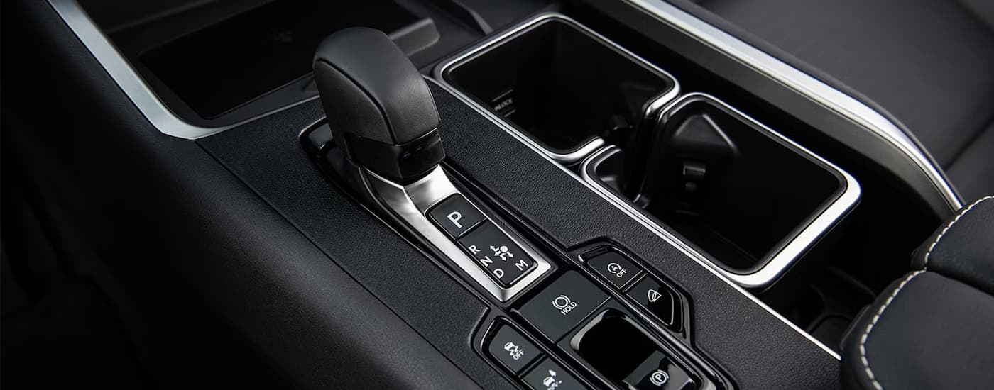 Shifter in the center console of a 2026 Lexus TX for sale in Peoria