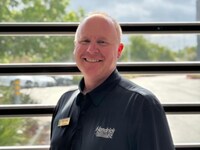Staff member JIM BURKE from ID_05b75ca919f8