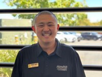 Staff member Denny Gu from ID_6415a19a33e9