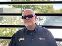 Staff member JOSEPH MINSTER from ID_7f45b9a66a4a