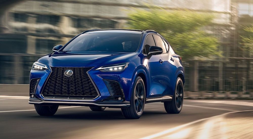 A blue 2024 Lexus NX is shown from the front at an angle after leaving a Lexus dealer near Bayside.